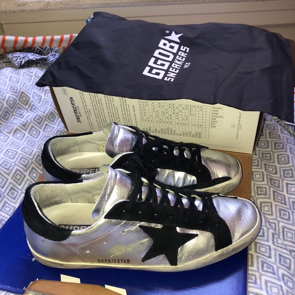 silver and black golden goose